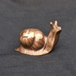 Bronzeornament Schnecke