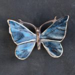 Bronzeornament bunter Schmetterling